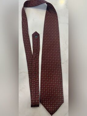 Dior Men's Burgundy Tie with Gold Accent Medallion Pattern